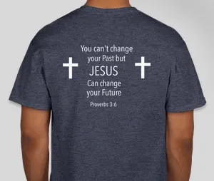 A person wearing a t-shirt with the words " you can 't change your past but jesus can change your future ".